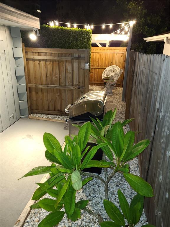 161 Golden Gate Point, Unit 1 Sarasota, FL 34236 - Photo 37 of 79 a view of a potted plants with wooden fence