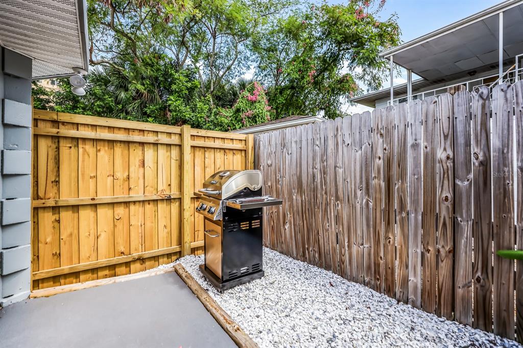 161 Golden Gate Point, Unit 1 Sarasota, FL 34236 - Photo 52 of 79 a view of outdoor space with wooden fence