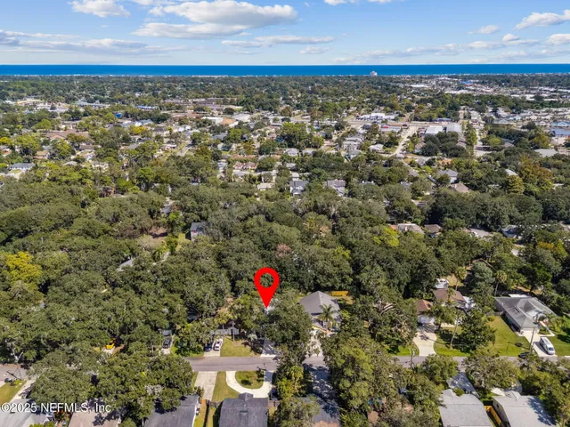 an aerial view of residential building with parking space