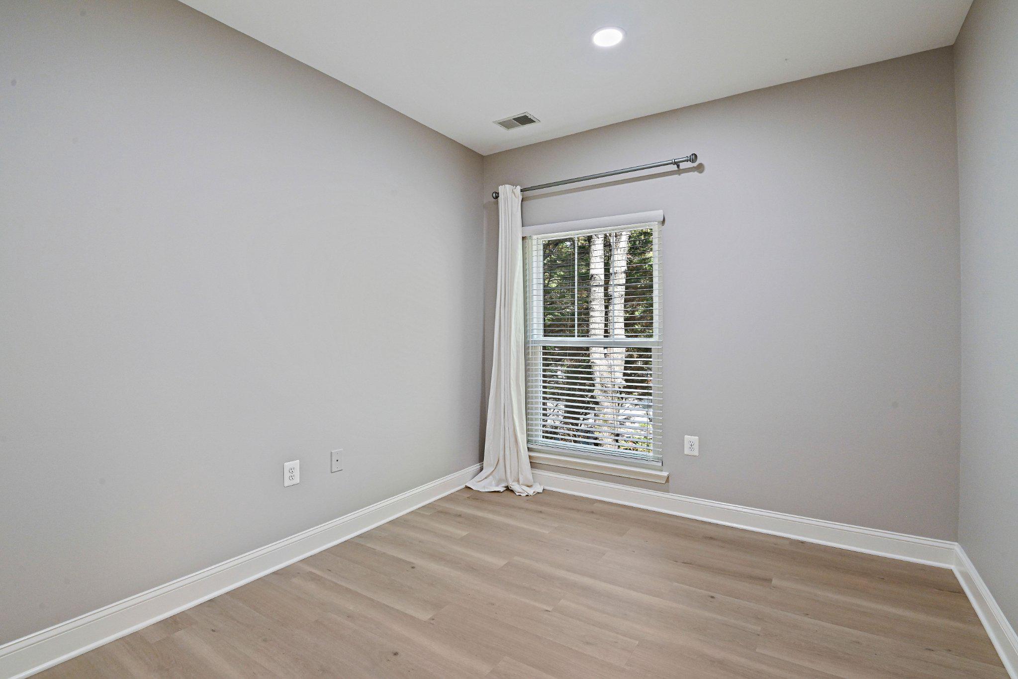 1519 North Point Drive, Unit 202 Reston, VA 20194 - Photo 27 of 49 Bright office or guest bedroom with nature views.