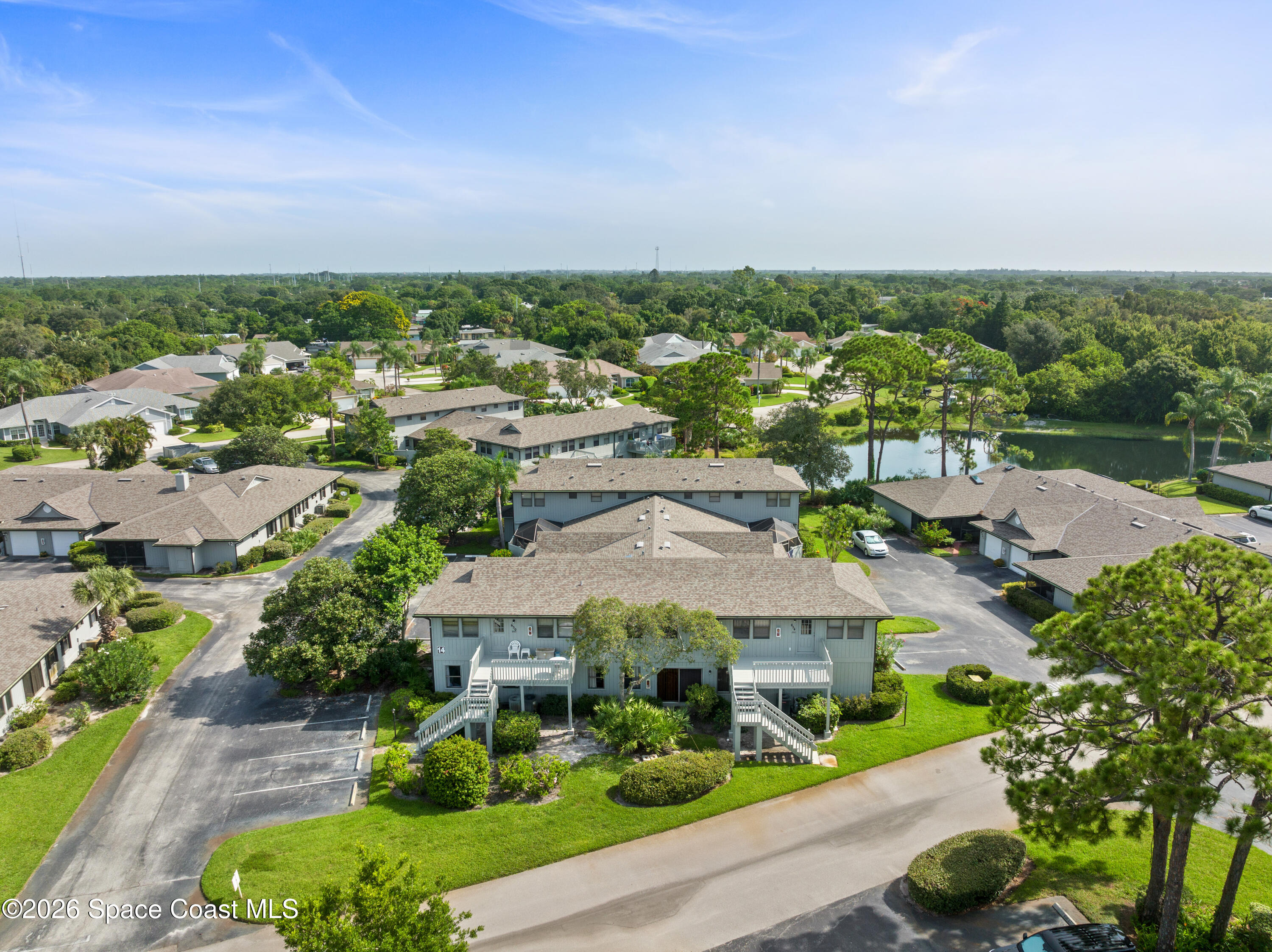 654 Centre Court Southwest, Unit 201 Vero Beach, FL 32962 - Photo 18 of 20 an aerial view of multiple house