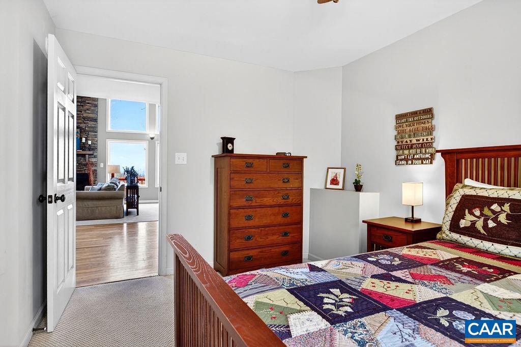 42 Peavy Point Wintergreen, VA 22967 - Photo 23 of 74 a bedroom with a bed and furniture