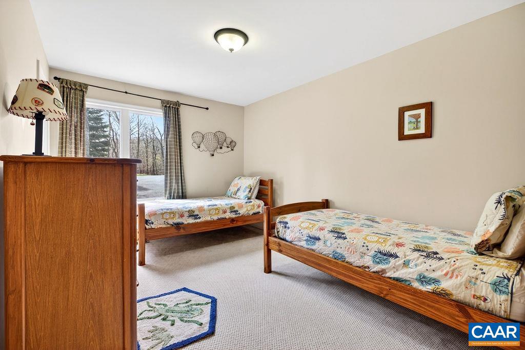 42 Peavy Point Wintergreen, VA 22967 - Photo 25 of 74 a bedroom with bed and wooden floor