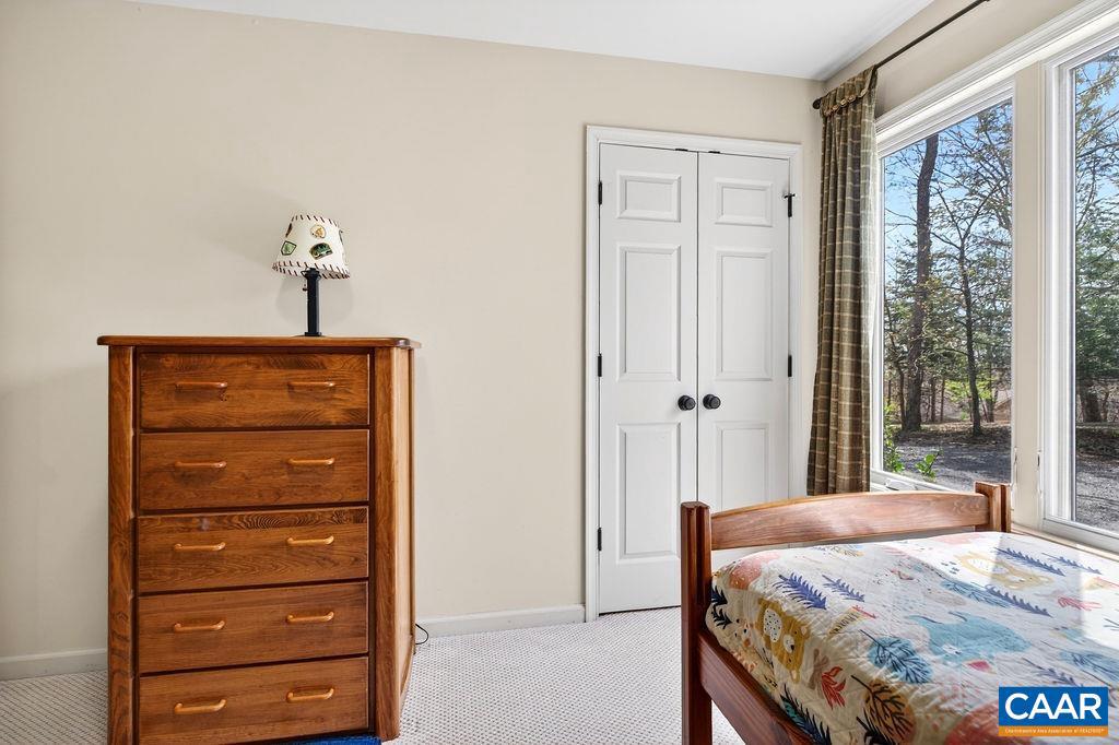 42 Peavy Point Wintergreen, VA 22967 - Photo 26 of 74 a bedroom with a bed and a dresser