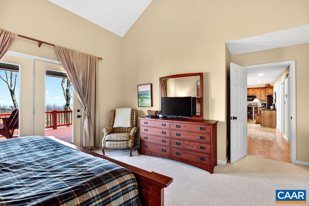 42 Peavy Point Wintergreen, VA 22967 - Photo 28 of 74 a bedroom with furniture and flat screen tv