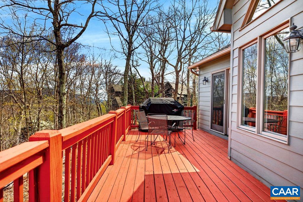 42 Peavy Point Wintergreen, VA 22967 - Photo 59 of 74 a balcony with wooden floor and furniture