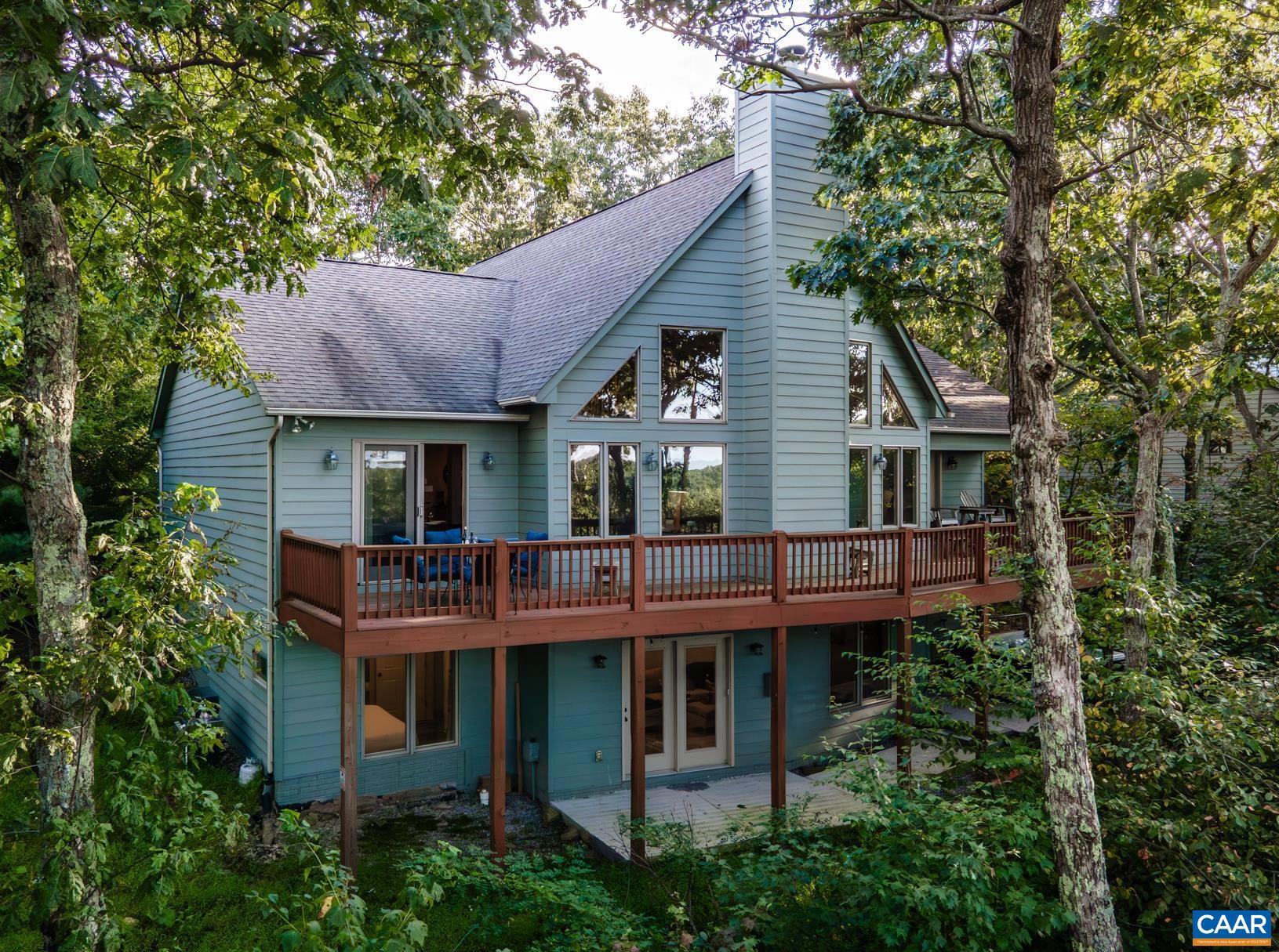 42 Peavy Point Wintergreen, VA 22967 - Photo 73 of 74 a view of house with a big yard and large tree