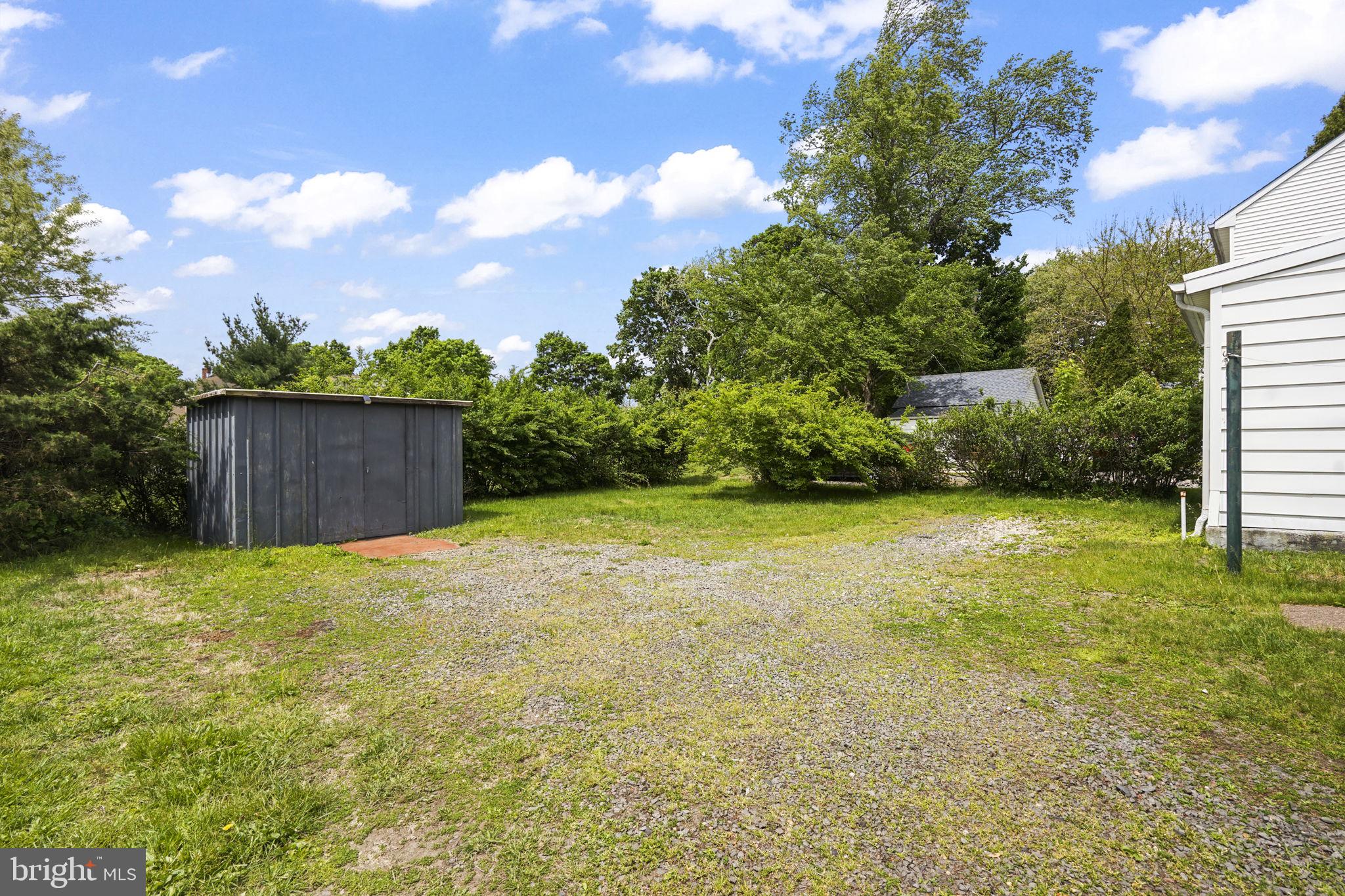 646 Ridge Road Monmouth Junction, NJ 08852 - Photo 27 of 47 Spacious yard with lush greenery.