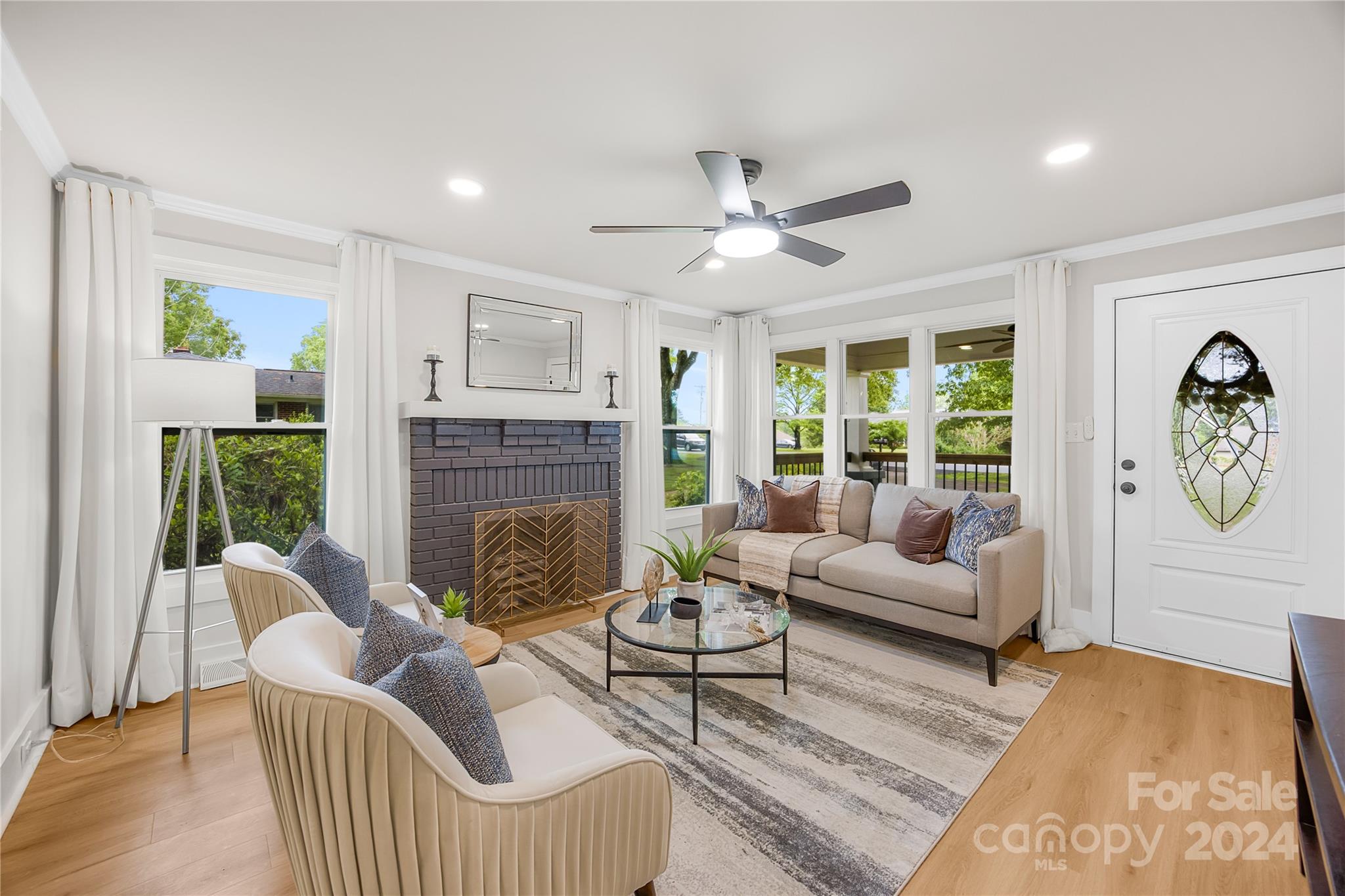 311 Roy Eaker Road Cherryville, NC 28021 - Photo 4 of 23 a living room with furniture and a fireplace