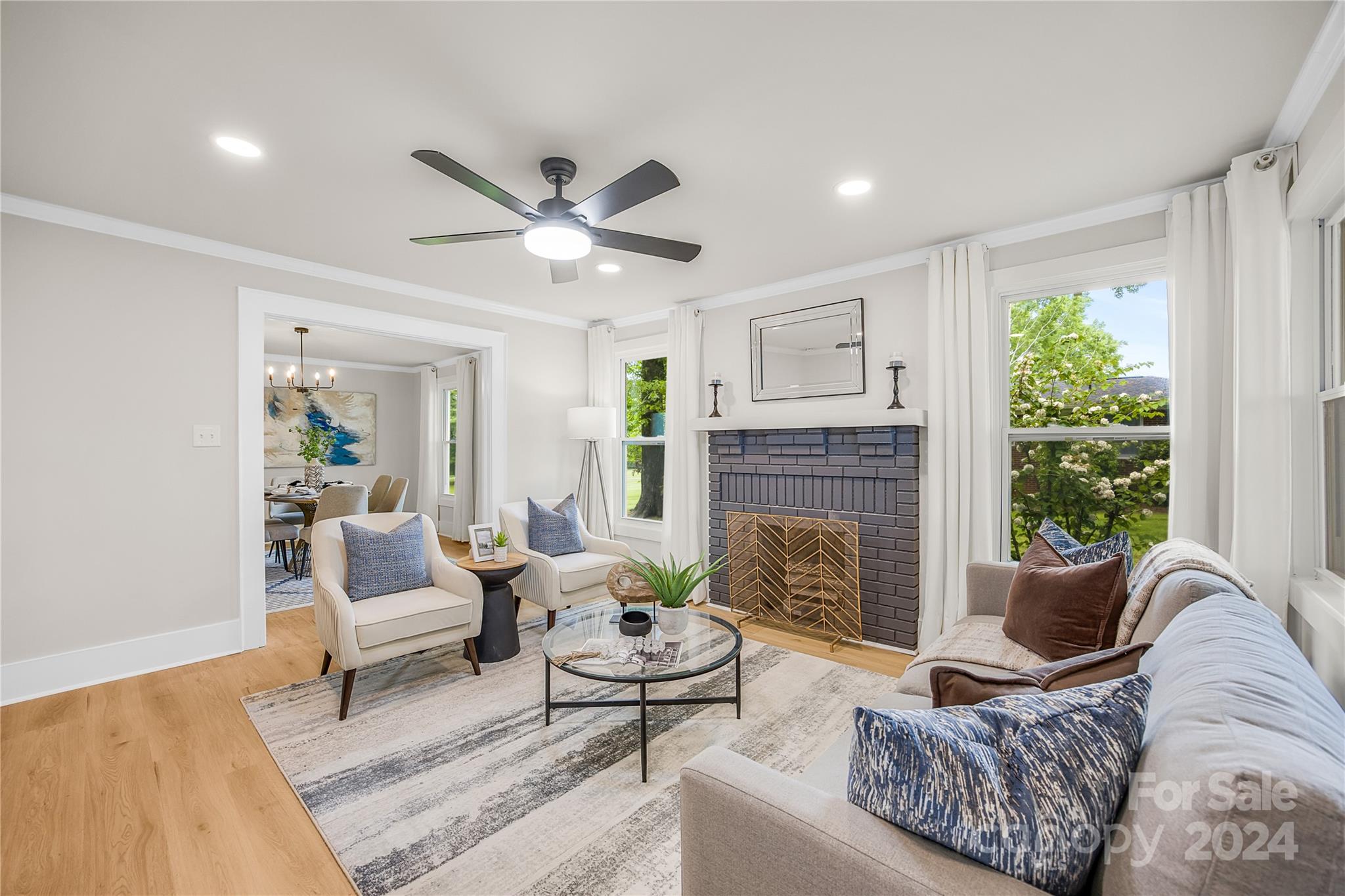 311 Roy Eaker Road Cherryville, NC 28021 - Photo 5 of 23 a living room with furniture and a fireplace
