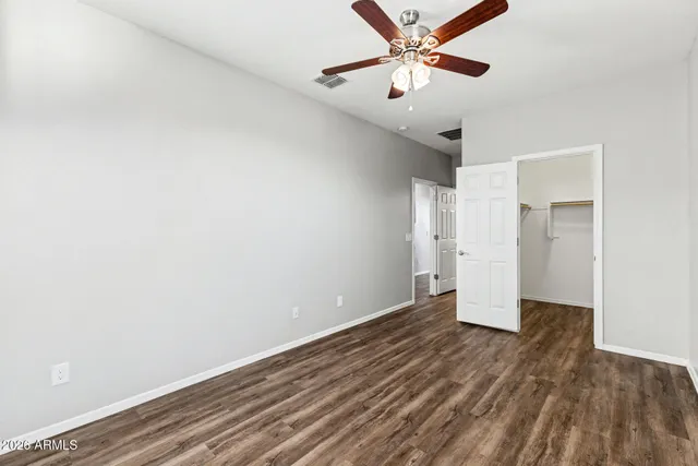 a bathroom with a toilet and a bathtub