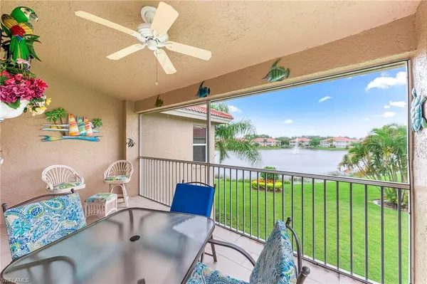 a view of a chairs and table in the patio