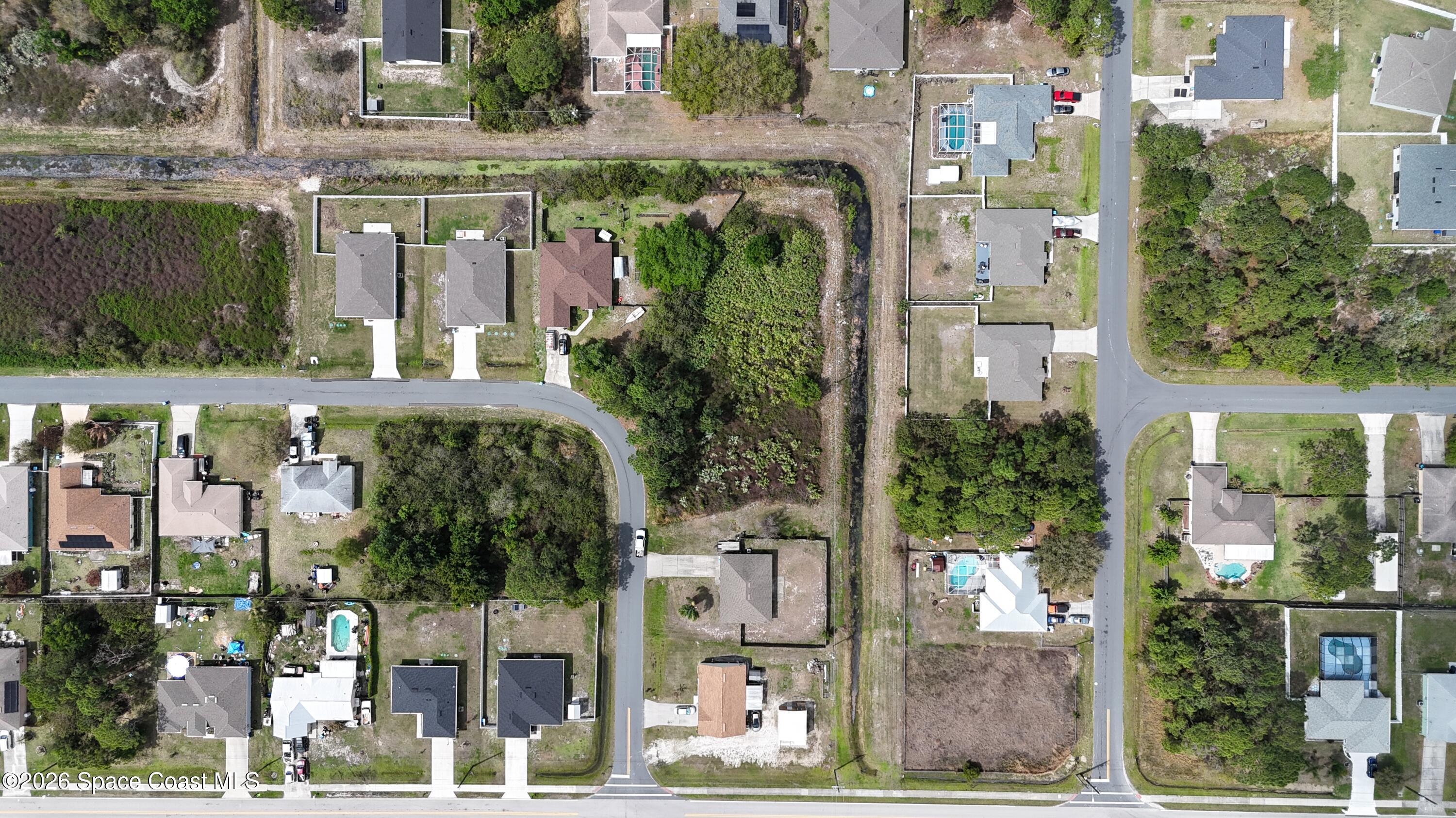 1805 Raintree Avenue Southeast Palm Bay, FL 32909 - Photo 7 of 14 a front view of a building with street view