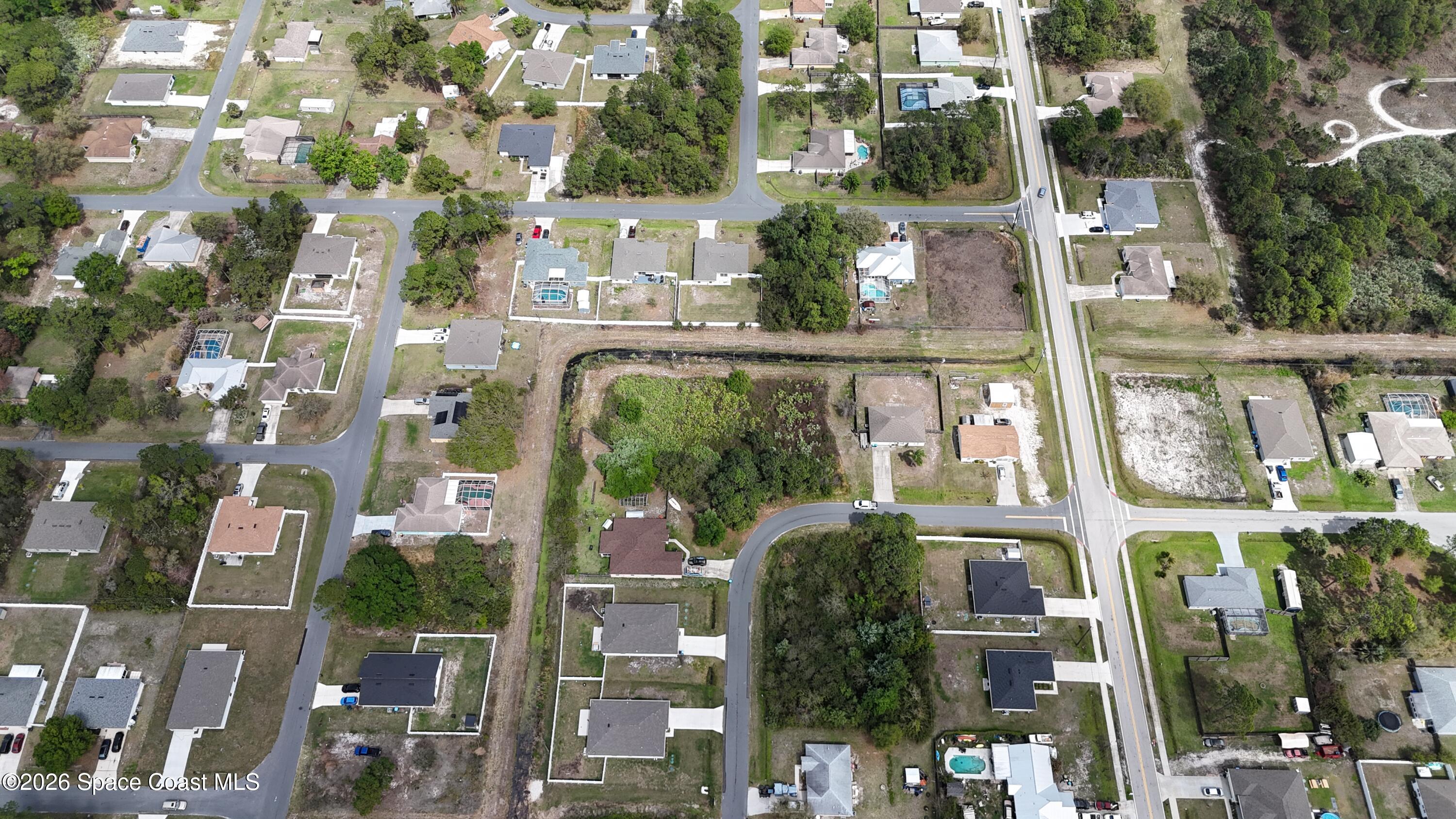 1805 Raintree Avenue Southeast Palm Bay, FL 32909 - Photo 9 of 14 a view of a city with tall buildings
