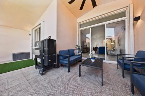 a bedroom with a bed and a potted plant