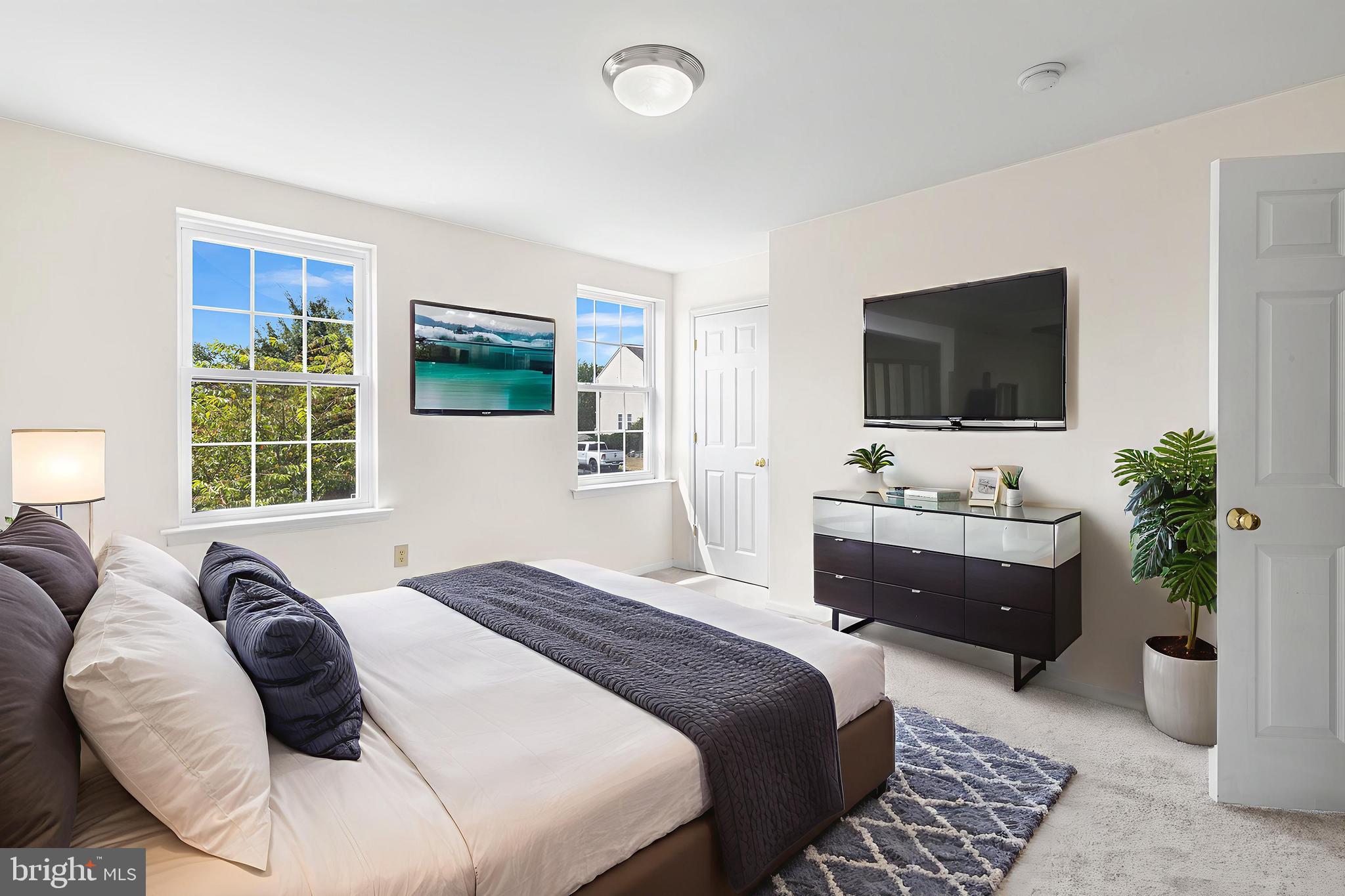 2004 Drake Run Royersford, PA 19468 - Photo 20 of 38 a bedroom with a bed and a flat screen tv