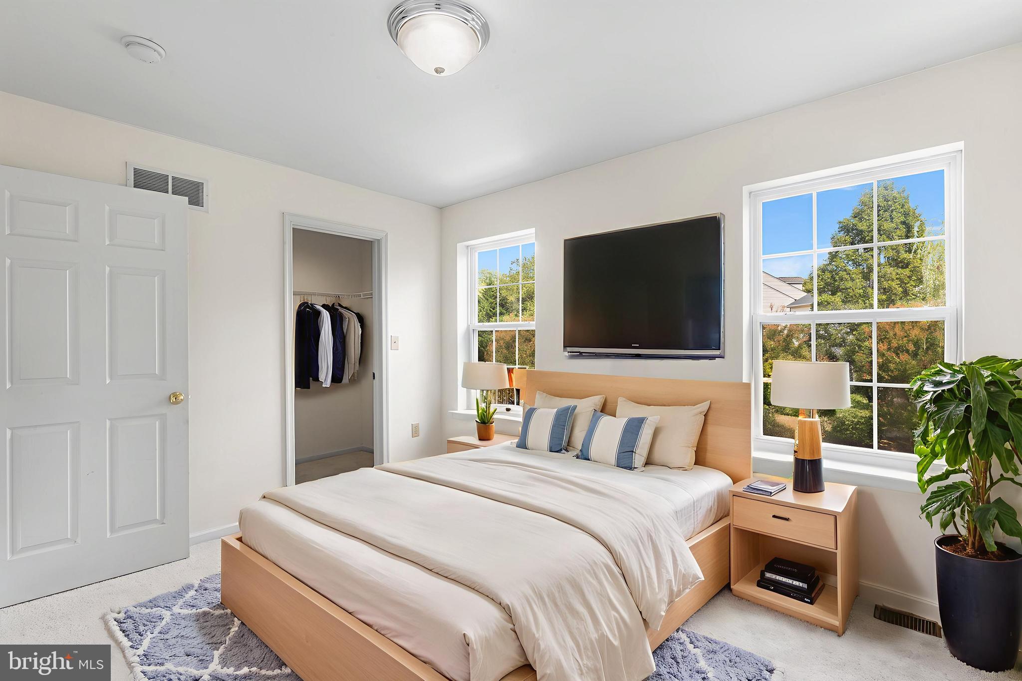 2004 Drake Run Royersford, PA 19468 - Photo 24 of 38 a bedroom with a bed and a flat screen tv