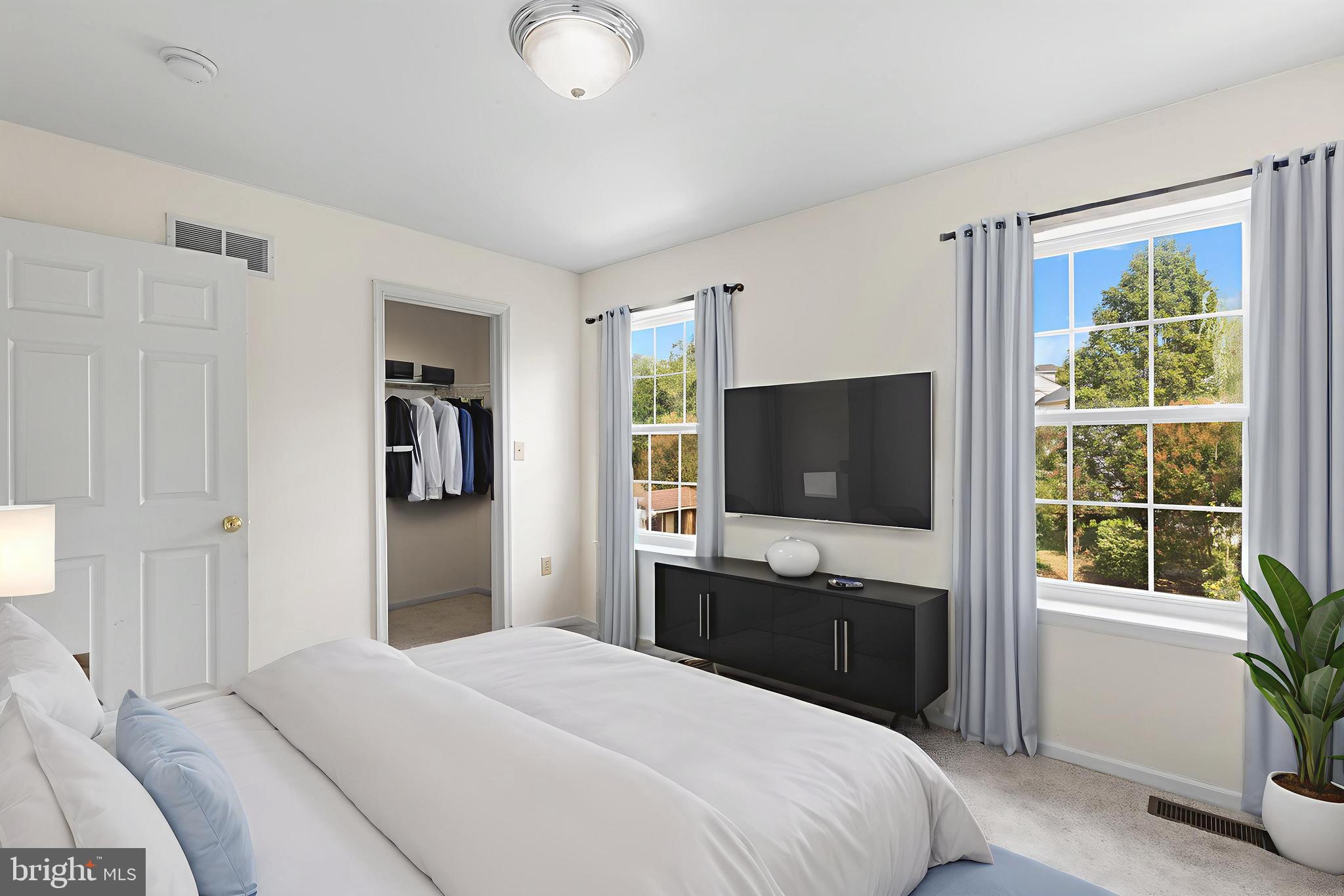 2004 Drake Run Royersford, PA 19468 - Photo 25 of 38 a bedroom with a bed and a flat tv screen on wall