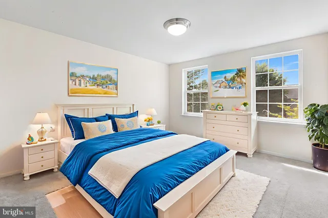 a bedroom with a bed and a closet