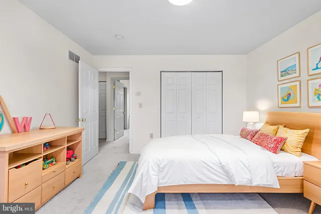 a view of a roof deck with wooden floor and seating space