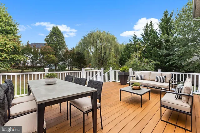 a view of a house with swimming pool in front of it