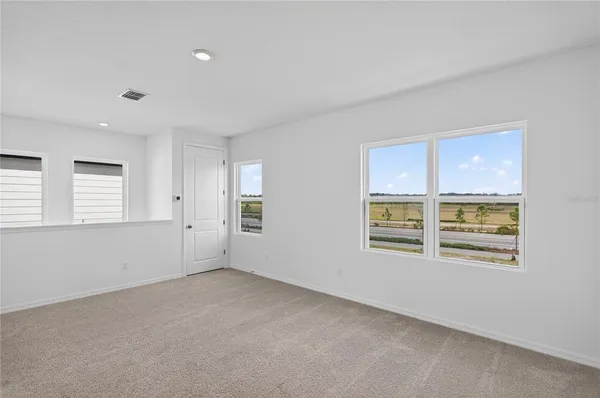 a front view of a house with a garage
