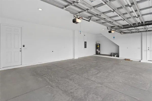 a view of hallway with a garage