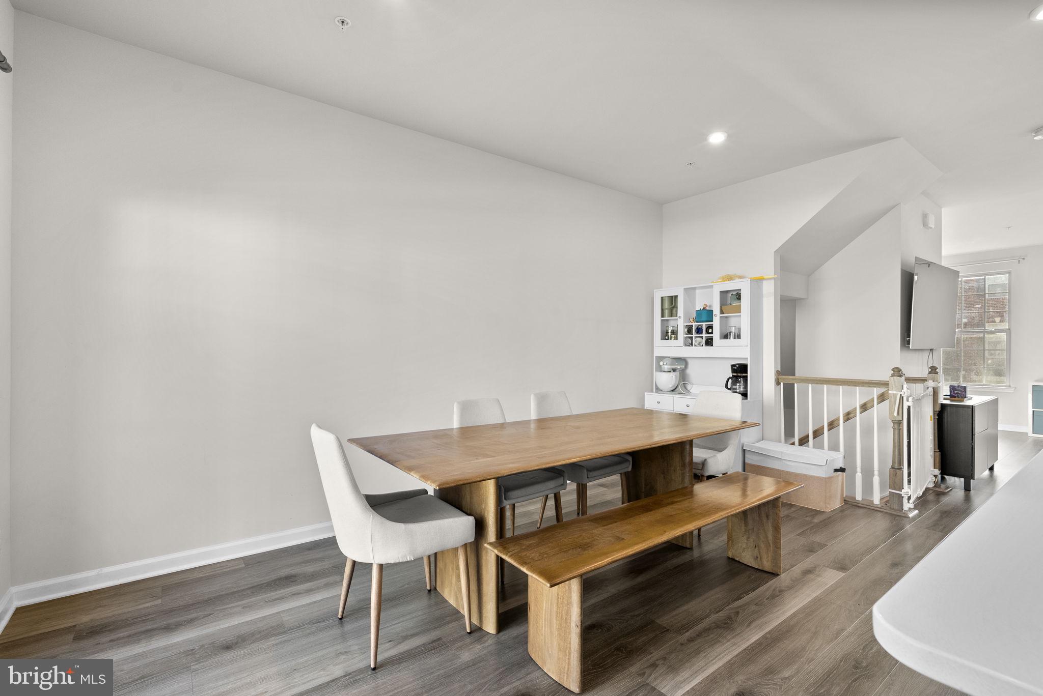 7911 Mine Run Road Hanover, MD 21076 - Photo 11 of 49 a living room with furniture and a table