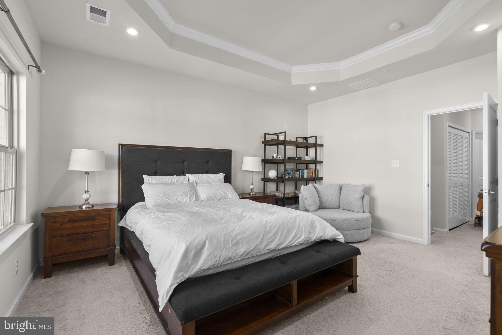 7911 Mine Run Road Hanover, MD 21076 - Photo 18 of 49 a bedroom with a bed furniture and a large window