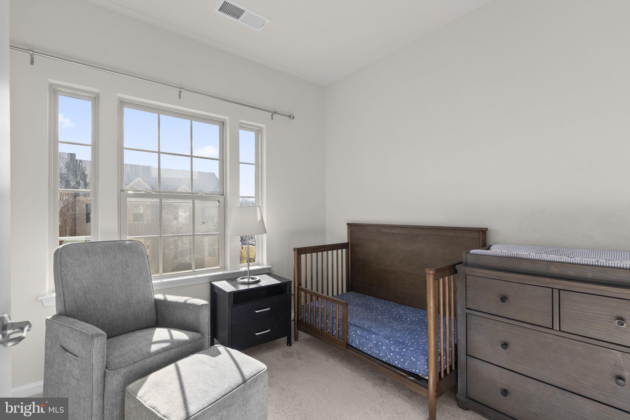 7911 Mine Run Road Hanover, MD 21076 - Photo 27 of 49 a living room with furniture and windows