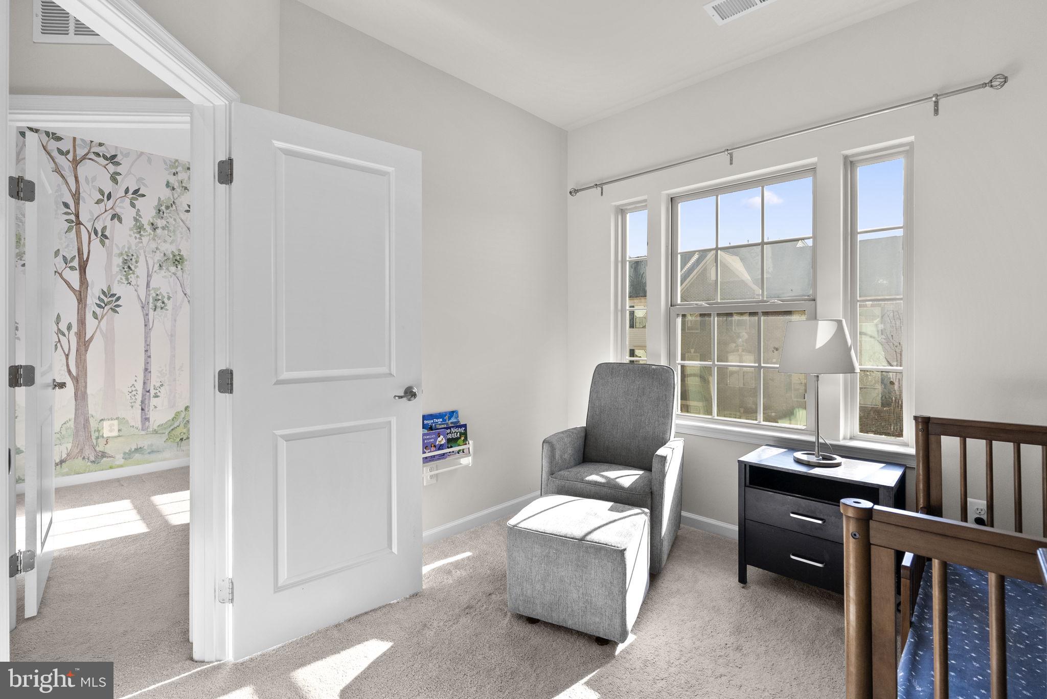 7911 Mine Run Road Hanover, MD 21076 - Photo 28 of 49 a living room with furniture and a window