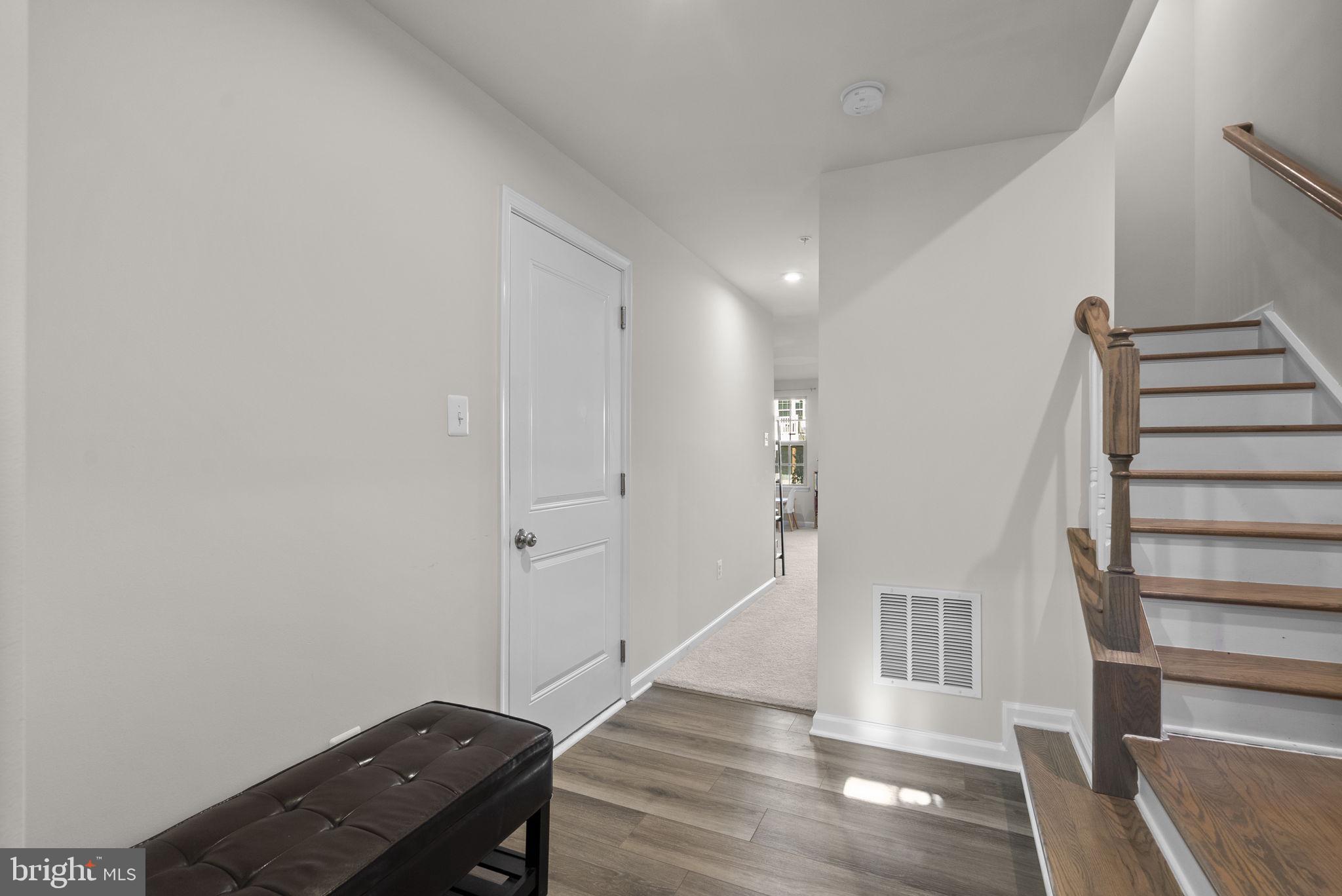7911 Mine Run Road Hanover, MD 21076 - Photo 3 of 49 a view of entryway with wooden floor