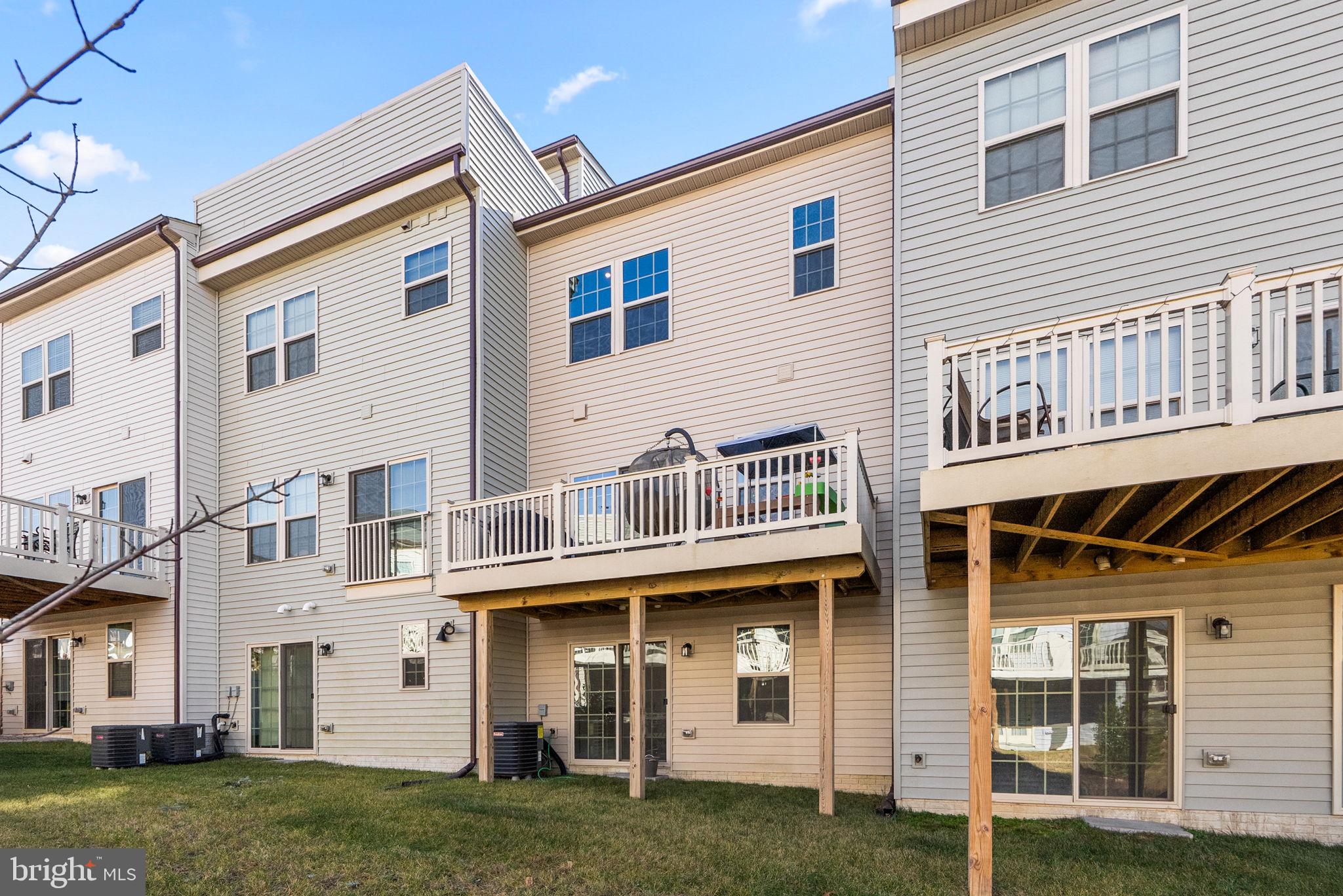 7911 Mine Run Road Hanover, MD 21076 - Photo 38 of 49 a view of a white house with large windows