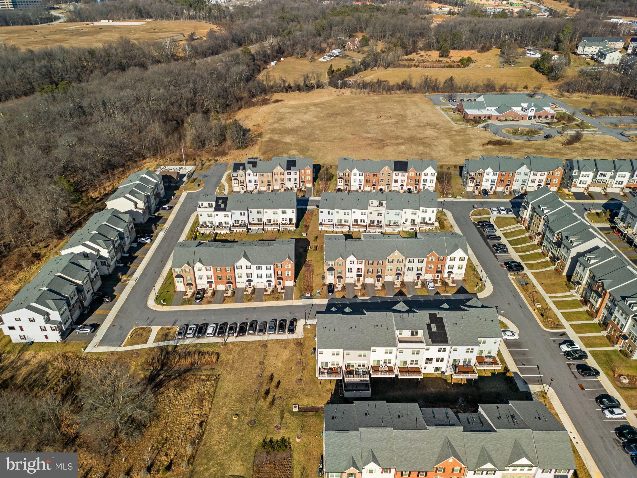 7911 Mine Run Road Hanover, MD 21076 - Photo 46 of 49 a view of swimming pool with a table and chairs
