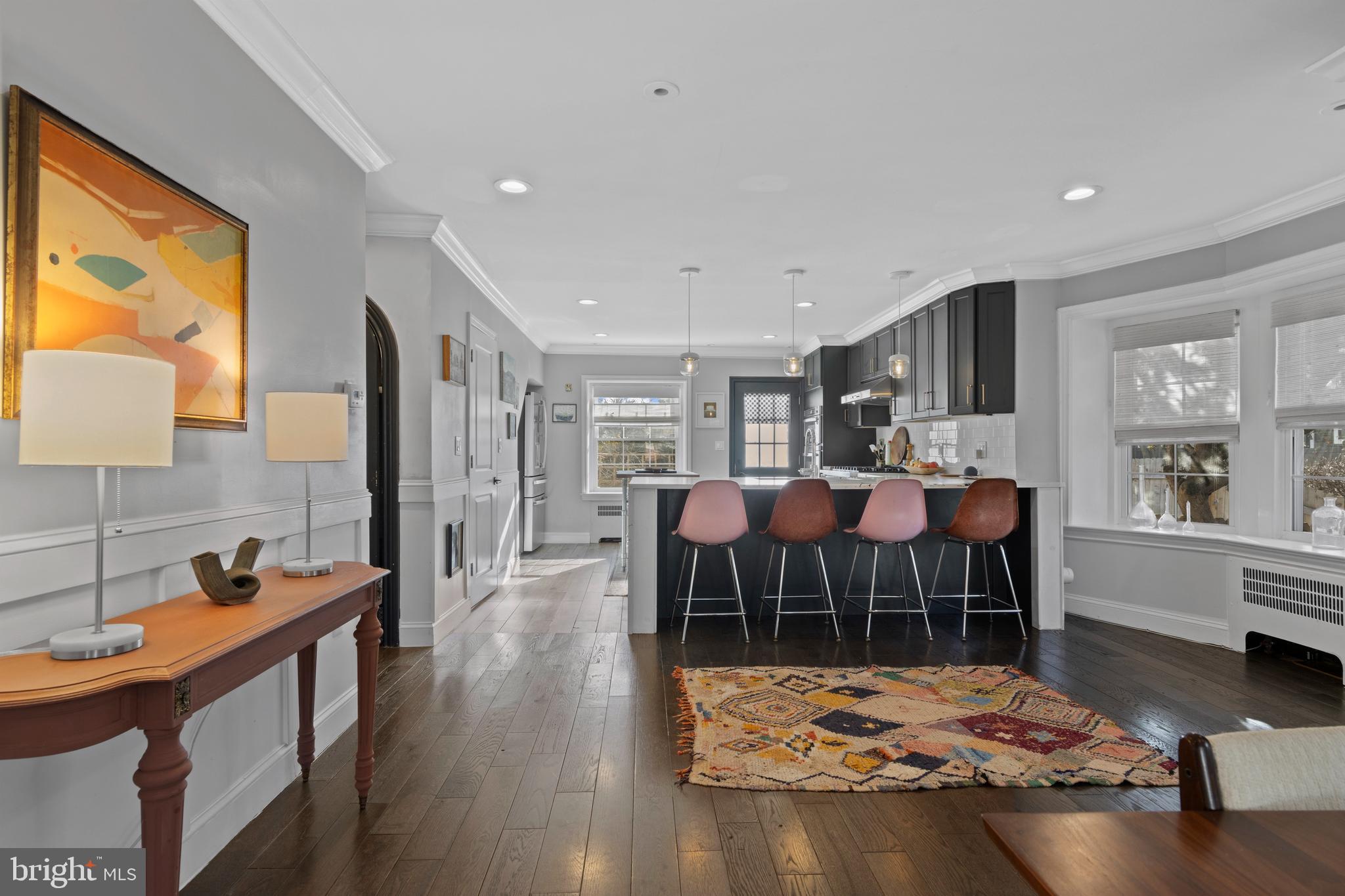 1354 Arbordale Road Wynnewood, PA 19096 - Photo 17 of 56 a living room with dining room and wooden floor