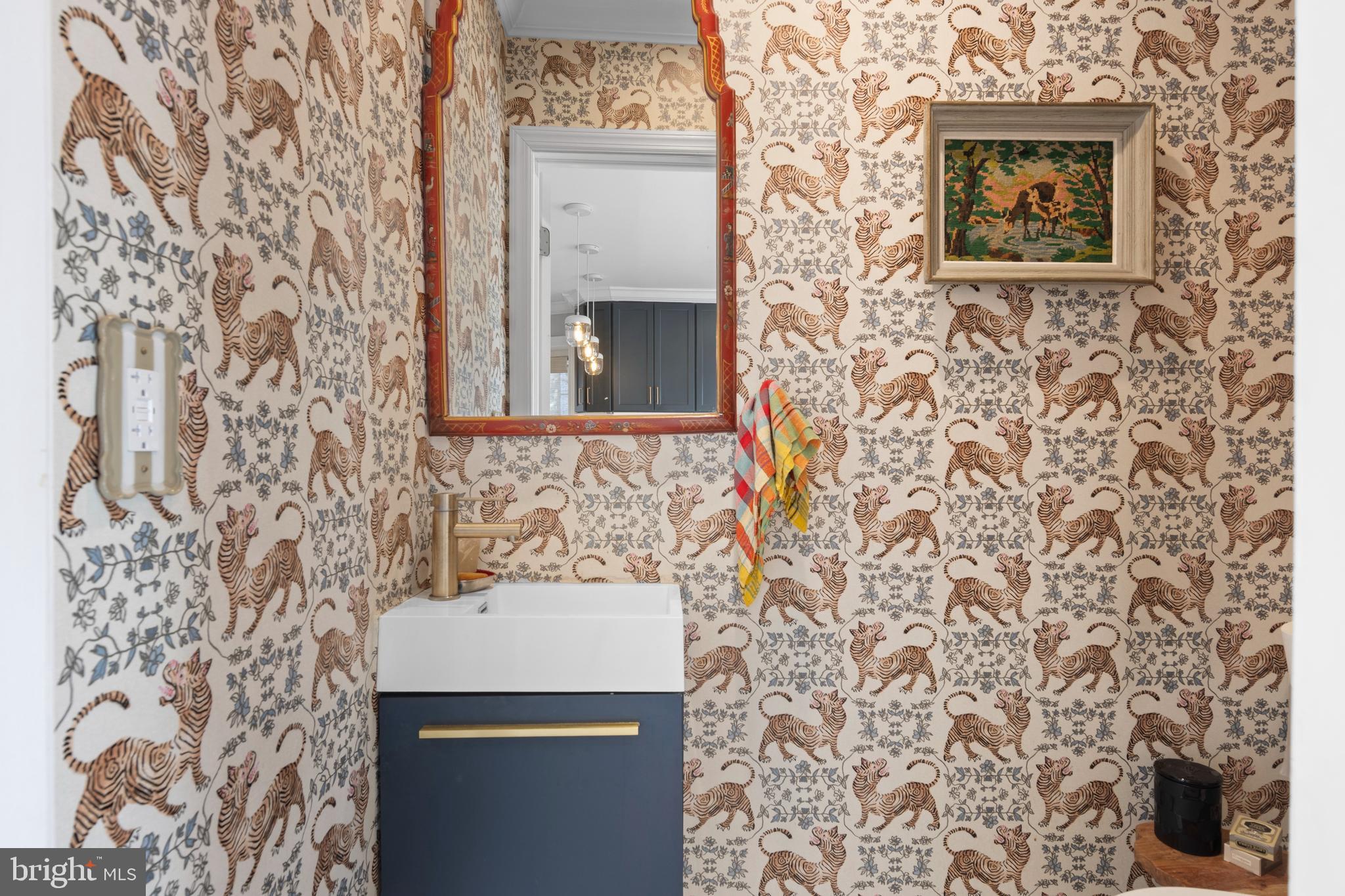 1354 Arbordale Road Wynnewood, PA 19096 - Photo 22 of 56 a bathroom with a sink and a mirror