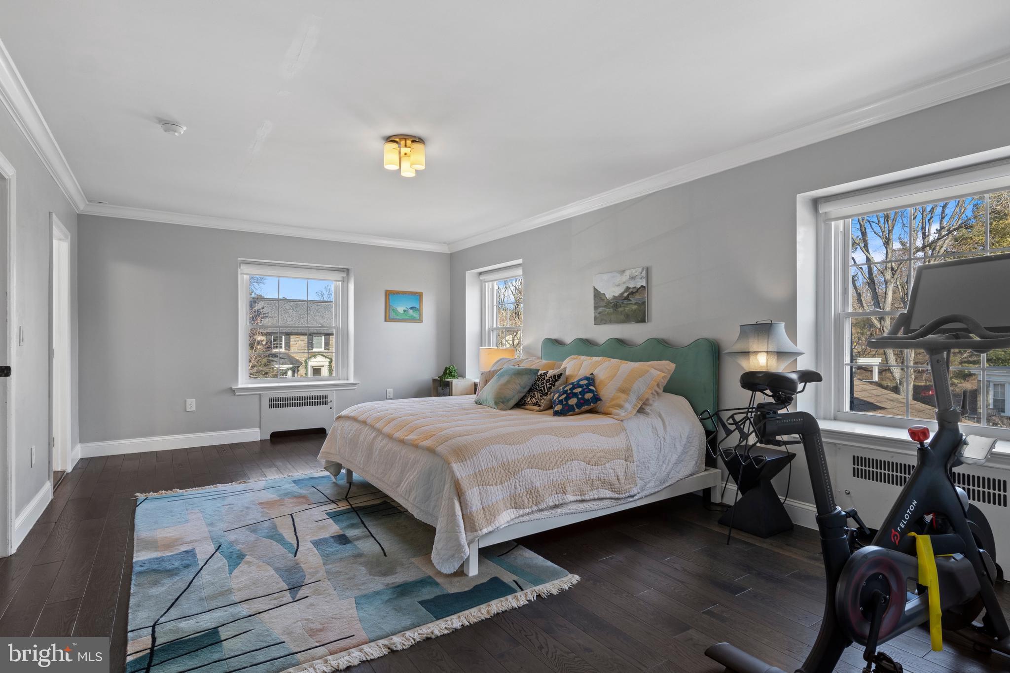1354 Arbordale Road Wynnewood, PA 19096 - Photo 26 of 56 a bedroom with a bed a dresser and next to a window