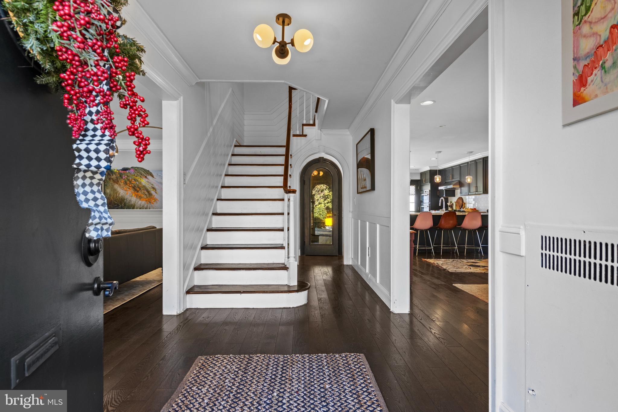 1354 Arbordale Road Wynnewood, PA 19096 - Photo 3 of 56 a view of entryway with stairs and wooden floor