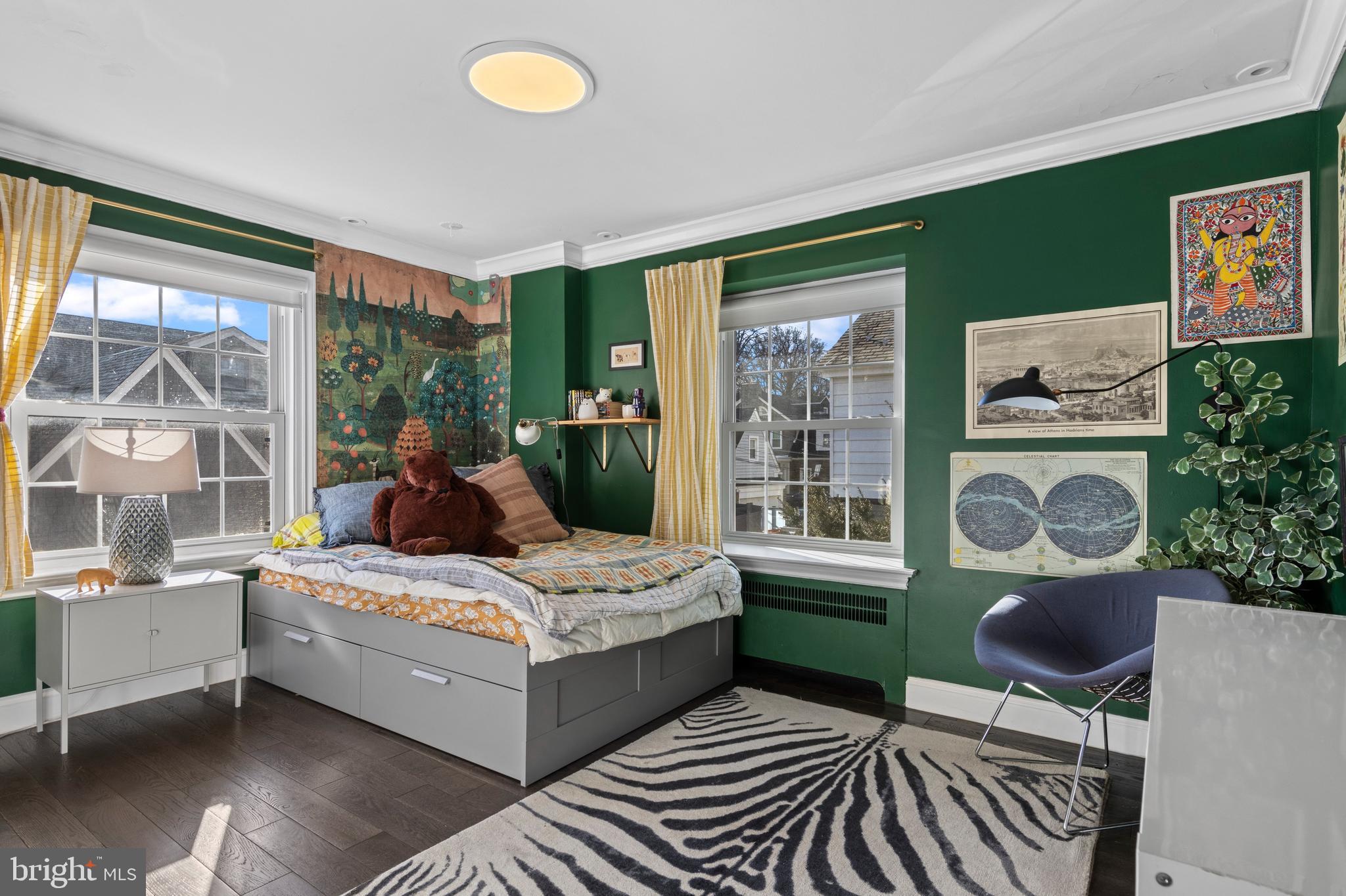 1354 Arbordale Road Wynnewood, PA 19096 - Photo 35 of 56 a bedroom with a bed and wooden floor