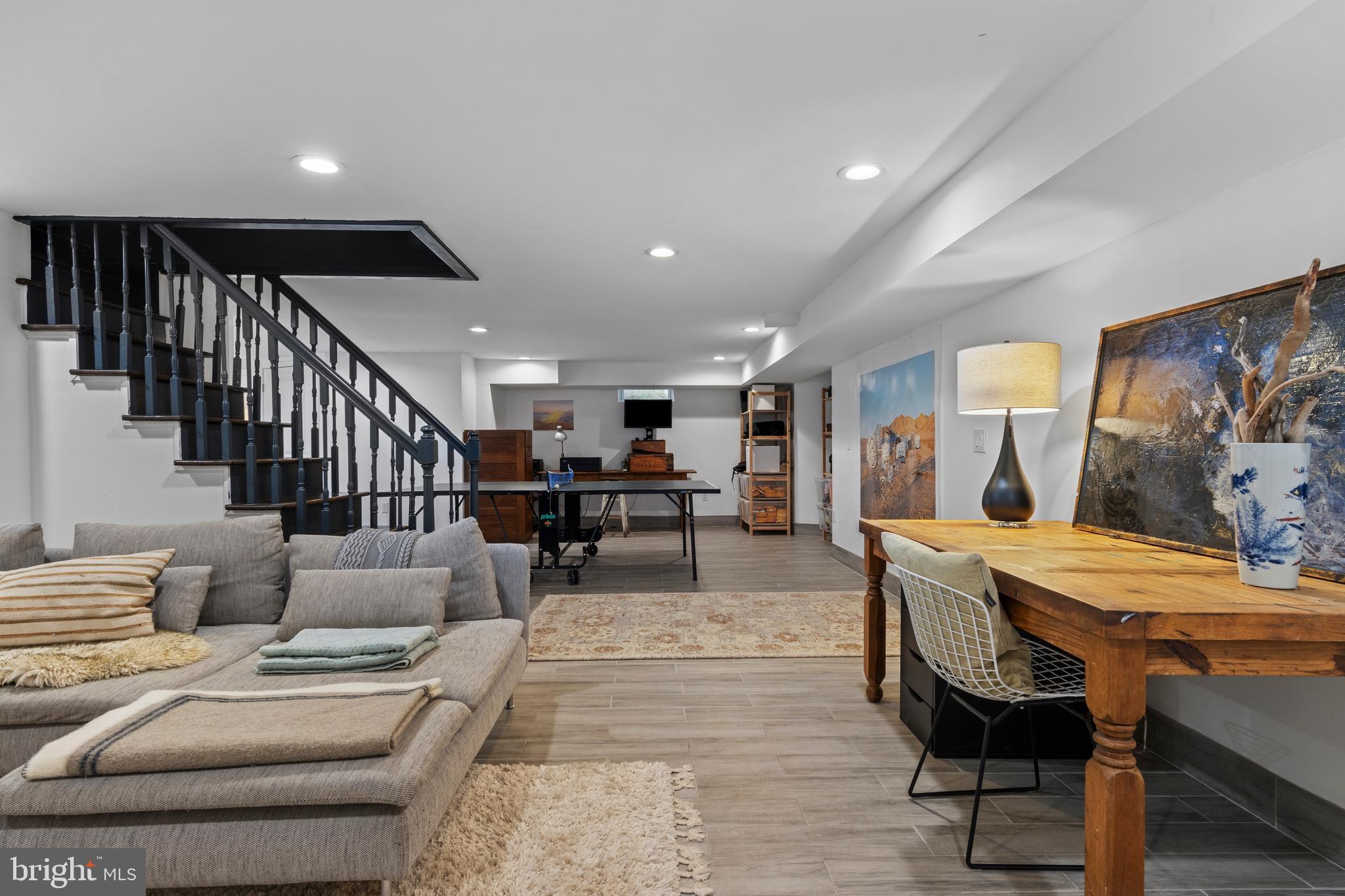 1354 Arbordale Road Wynnewood, PA 19096 - Photo 40 of 56 a living room with furniture and a flat screen tv