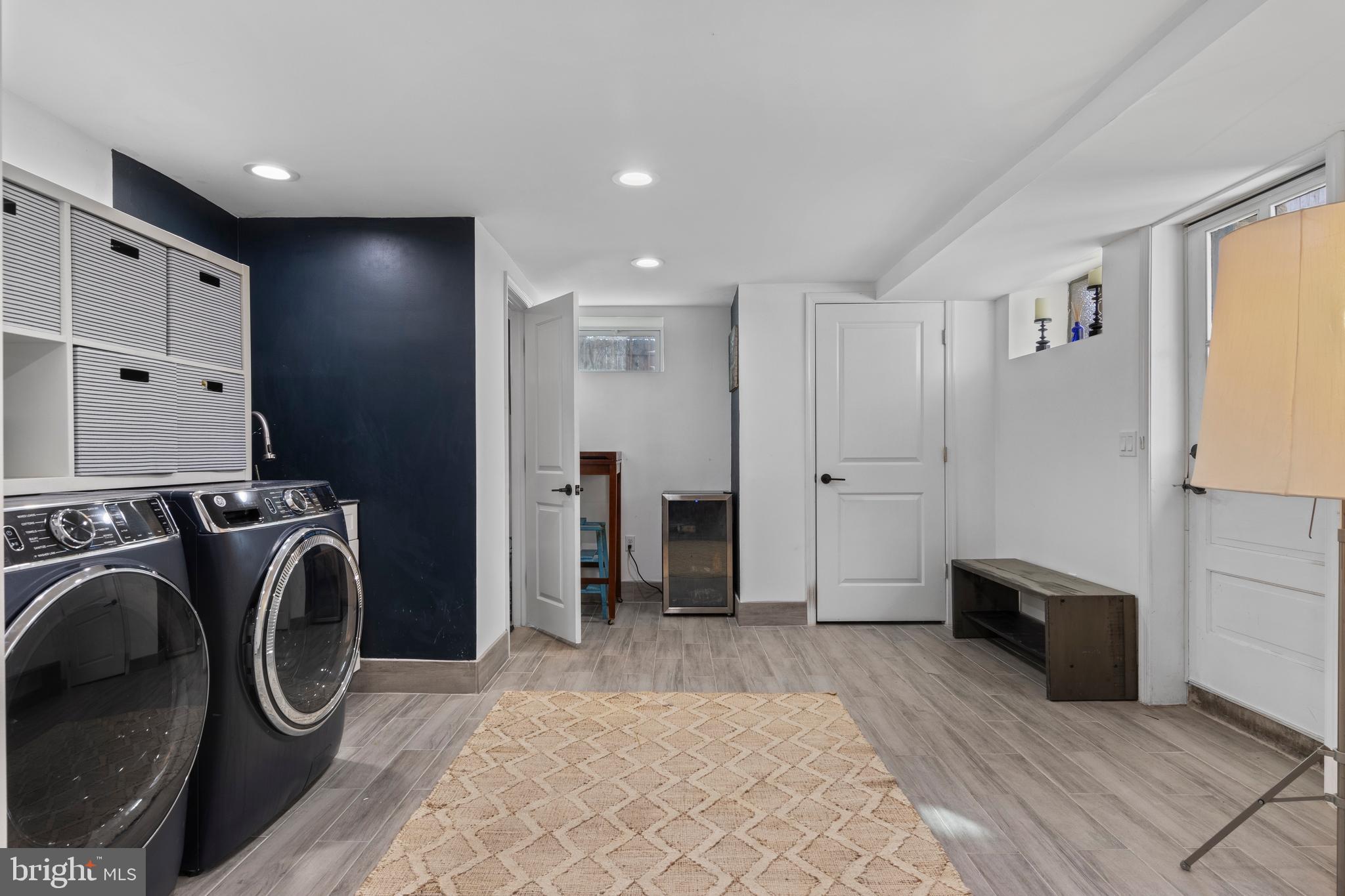1354 Arbordale Road Wynnewood, PA 19096 - Photo 45 of 56 a view of a hallway with washer and dryer