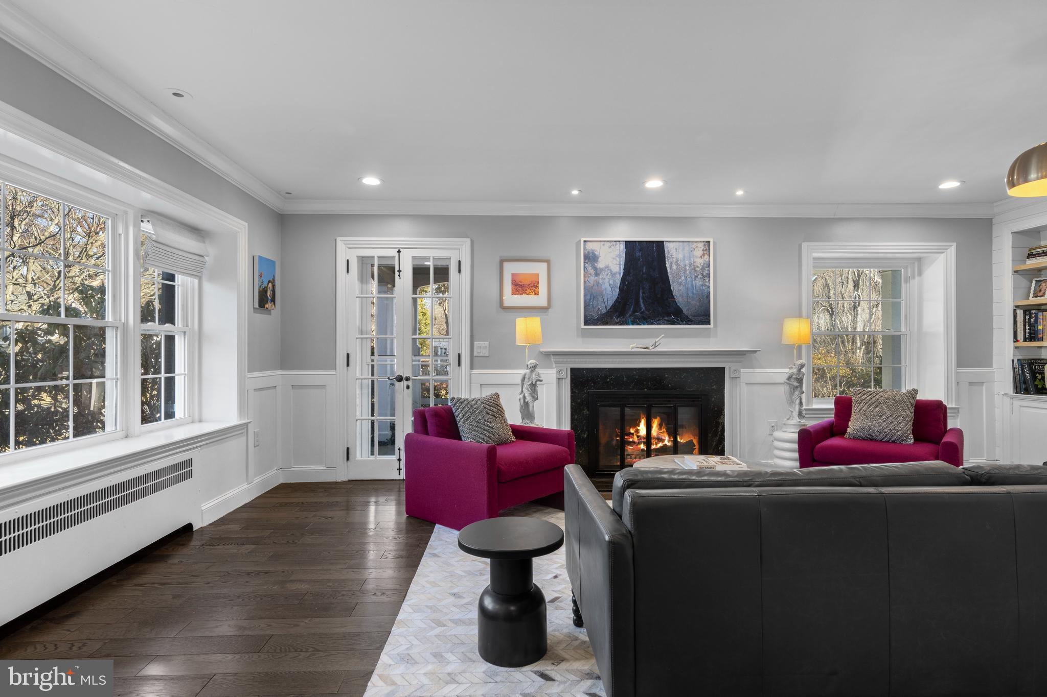 1354 Arbordale Road Wynnewood, PA 19096 - Photo 7 of 56 a living room with furniture and a fireplace
