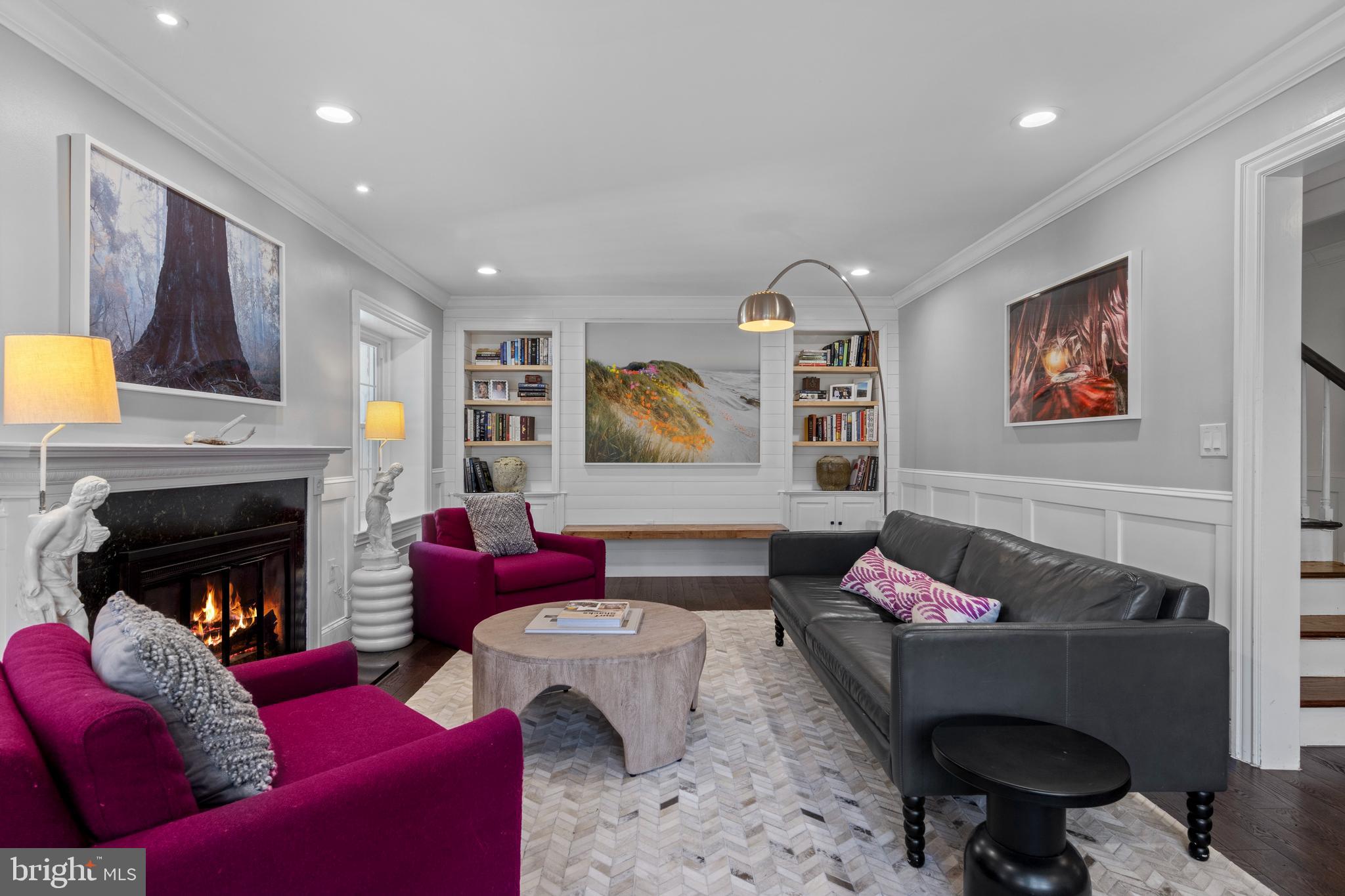 1354 Arbordale Road Wynnewood, PA 19096 - Photo 8 of 56 a living room with furniture and a fireplace