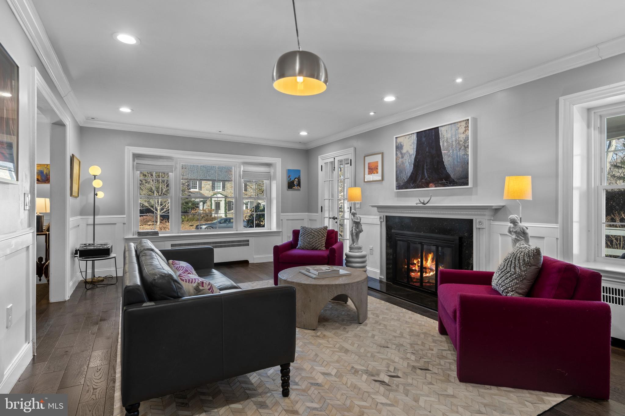 1354 Arbordale Road Wynnewood, PA 19096 - Photo 9 of 56 a living room with furniture and a fireplace