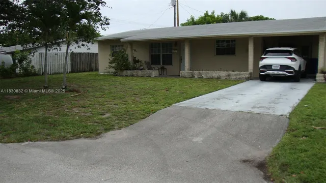 a house view with a garden space