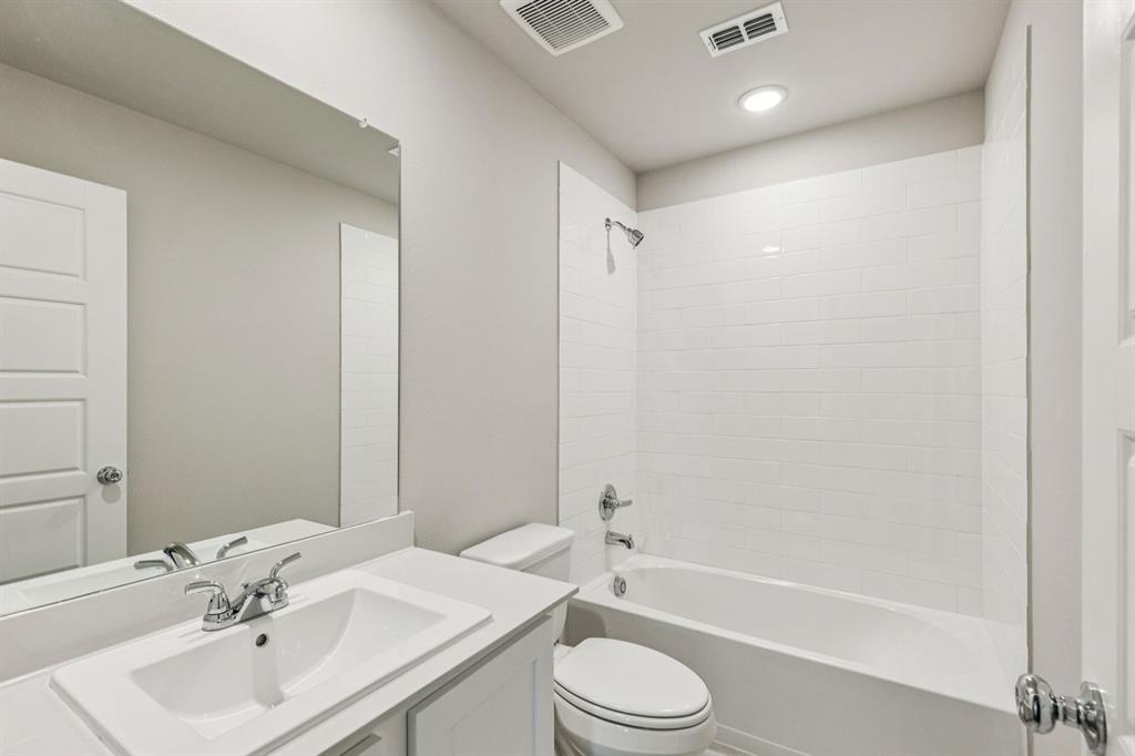 885 Rockcloud Drive Haslet, TX 76052 - Photo 20 of 27 Bathroom in the Harper home plan by Trophy Signature Homes – REPRESENTATIVE PHOTO