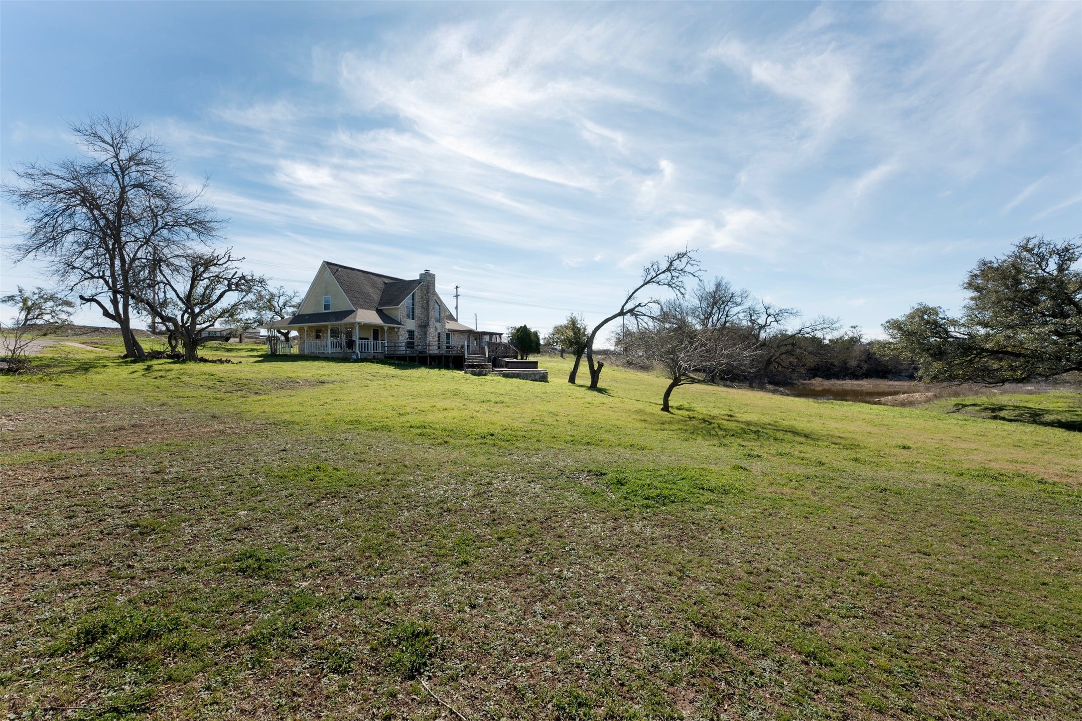 31305 Ranch Road 12 Dripping Springs, TX 78620 - Photo 29 of 32 a view of a field with sitting space
