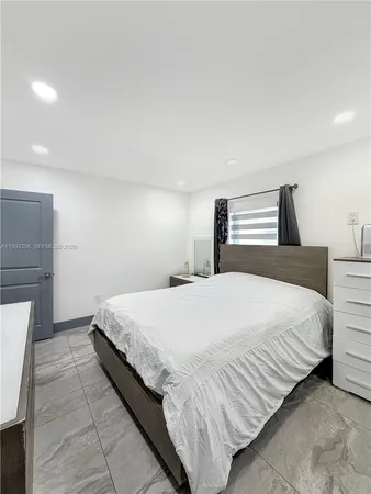 a view of swimming pool outdoor outdoor seating and city view