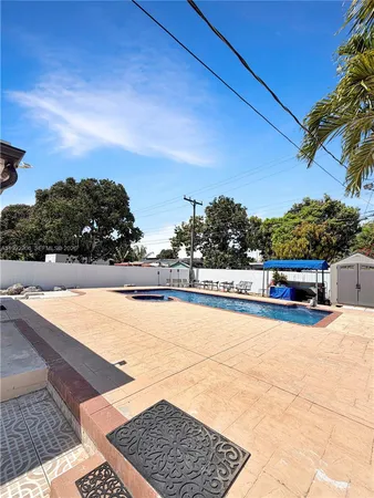 a view of an outdoor space and swimming pool