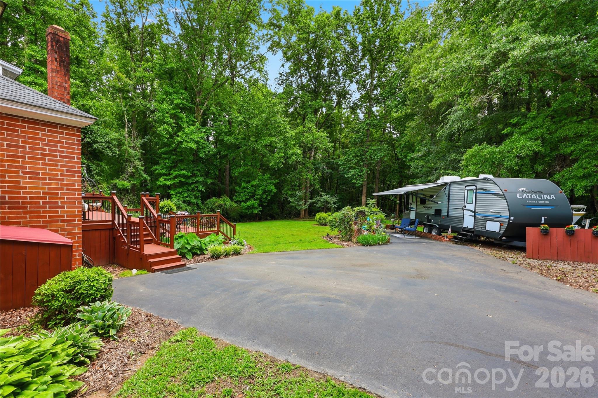 106 Maple Street Fort Mill, SC 29715 - Photo 40 of 44 a view of a park with large trees